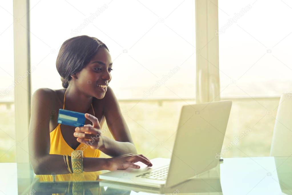 Black woman with laptop