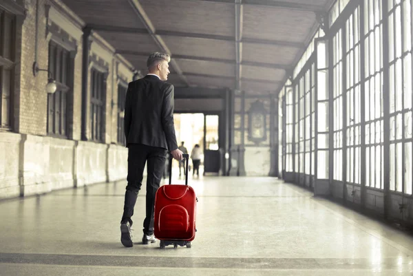 Businessman with suitcase — Stock Photo, Image