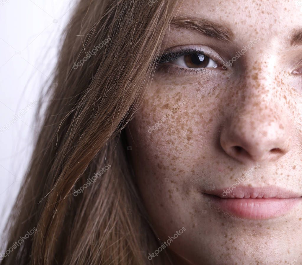 Portrait of a girl with freckles