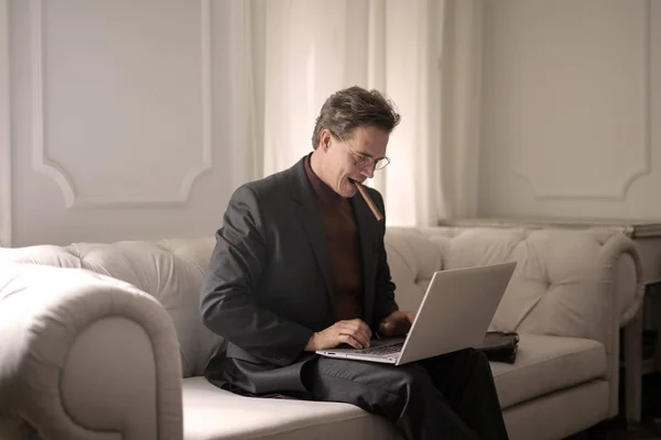 Buisnessman Smoking Cigar While Using Laptop — Stock Photo, Image