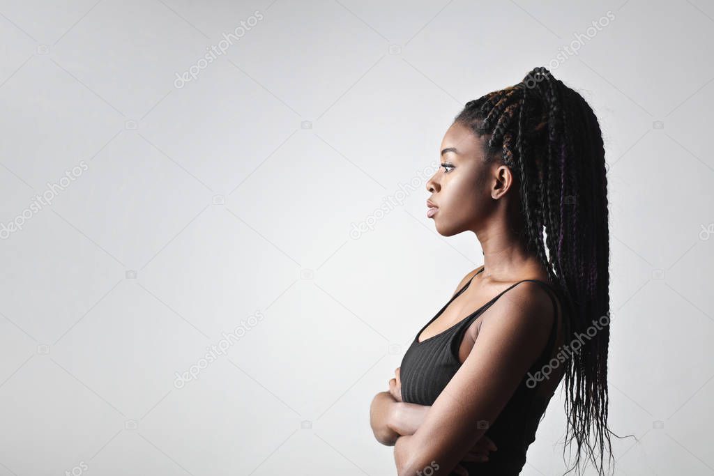 Young african woman posing in profile