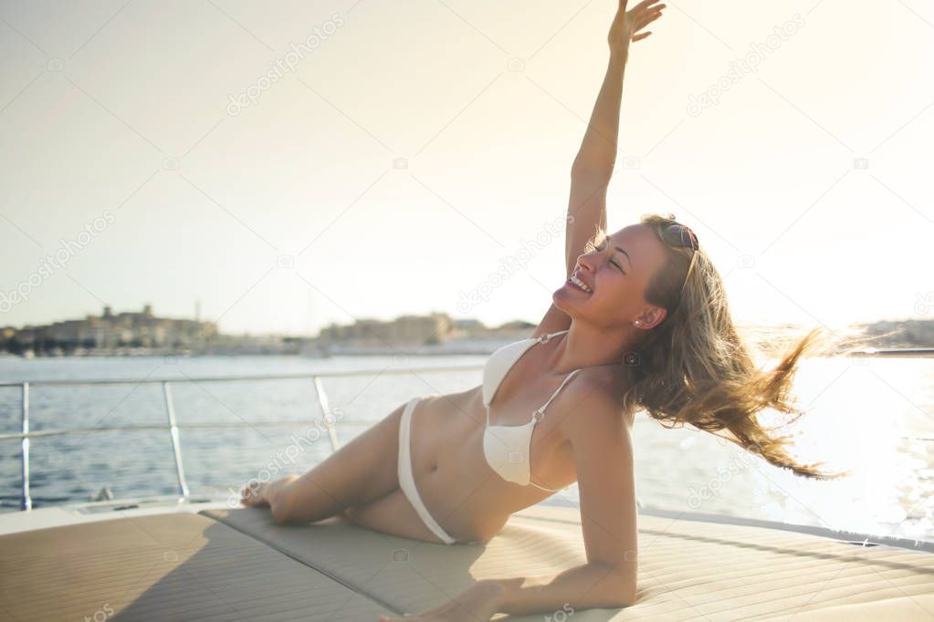 Happy girl on a boat