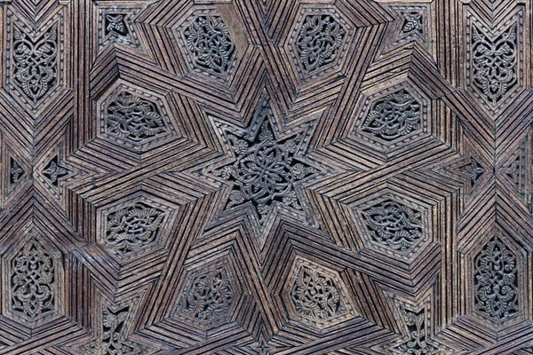 Wood carvings of a traditional islamic geometric design. Royalty Free Stock Photos