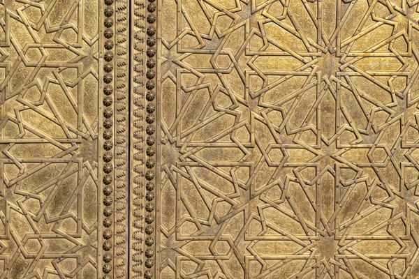 Golden door detail of the royal palace gate in Fez, Morocco. Stock Image