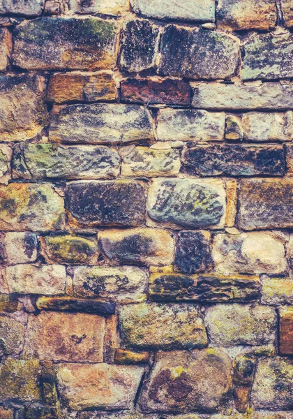 Alte Steinmauer bröckelt — Stockfoto