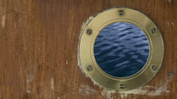 Grungy Porthole Ship Boat Slow Motion Waves Copy Space — Stock Video