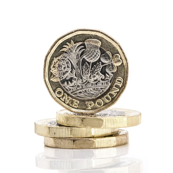 4 New One Pound coins on a white background — Stock Photo, Image