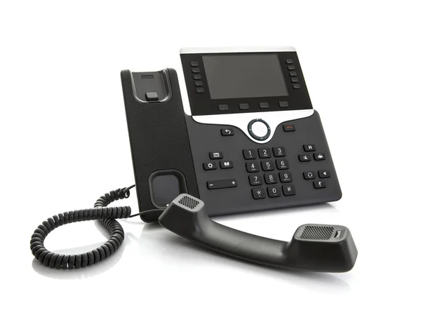 Teléfono IP moderno de la oficina del negocio con la pluma sobre un fondo blanco — Foto de Stock