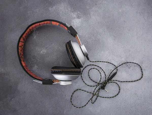 Pair Modern Black Orange Headphones Grey Rustict Background — Stock Photo, Image