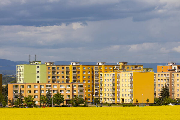 Zatec town and rapeseed field in northern Bohemia, Czech Republic
