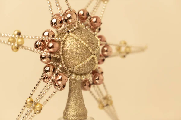 silver-gold Christmas ornament with corals