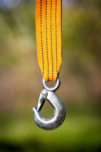 Steel hook on yellow strap — Stock Photo, Image