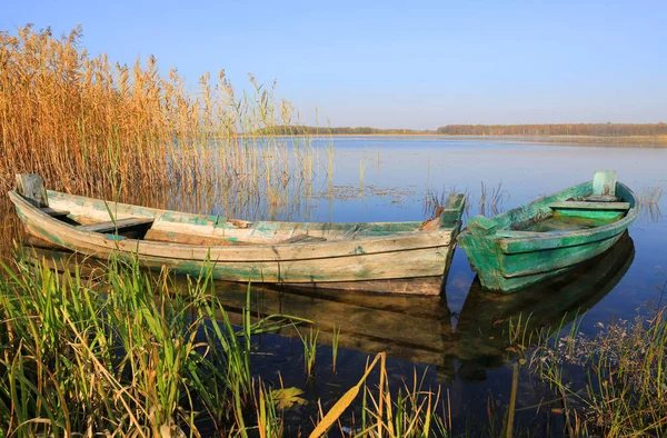 Wooden boats on lake — Stock Photo, Image
