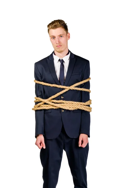Jovem empresário de terno amarrado — Fotografia de Stock