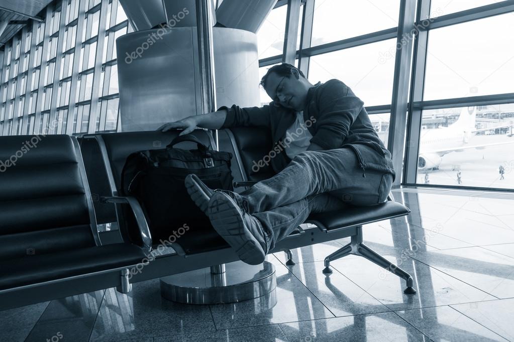 Man sleeping in the airport