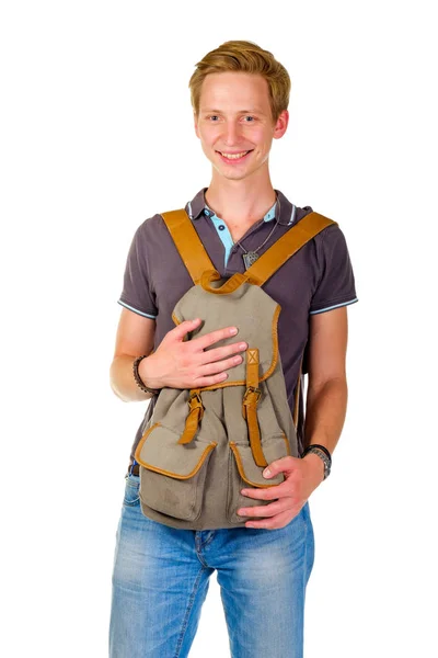 Jovem segurando uma mochila na frente , — Fotografia de Stock