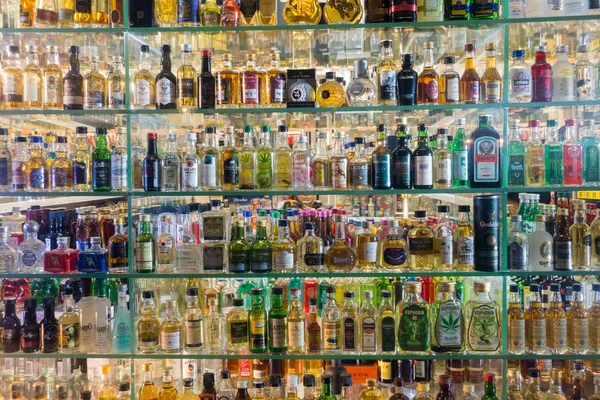 Mini bar bottles collection in the alcohol shop — Stock Photo, Image
