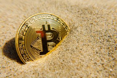 Altın bitcoin sikke kumdur