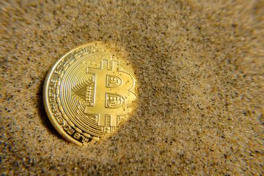 Altın bitcoin sikke kumdur