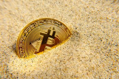 Altın bitcoin sikke kumdur
