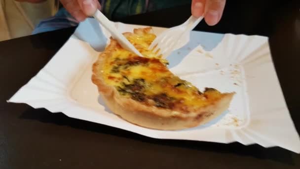 Woman cutting a pie from left to right pan — Stock Video