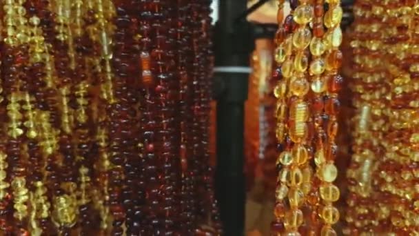 Jewelery from the Baltic amber — Stock Video