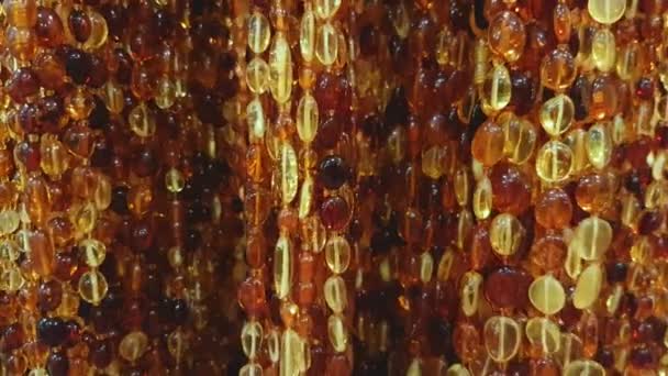 Jewelery from the Baltic amber — Stock Video