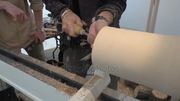 Worker processes the tree on machine — Stock Video