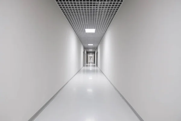 Long white empty corridor — Stock Photo, Image