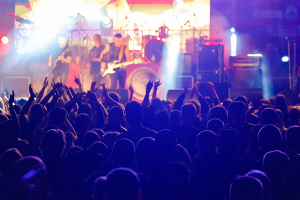 Fans at live rock music concert cheering — Stock Photo, Image