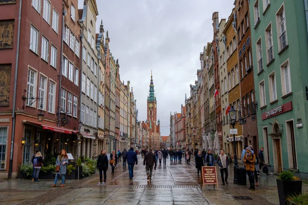 People walking in old city centre at day time — Stock Photo, Image