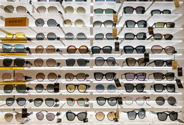 Designer sunglasses for sale in duty free store at airport Stock Editorial Photo toxawww 334669280