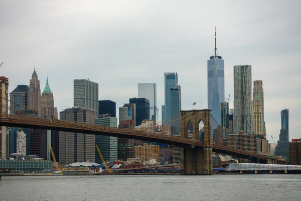 Brooklyn Bridge on background of Manhattan skyscrapers