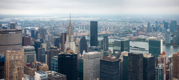 Aerial view of Manhattan skyscrapers at cloudy day time