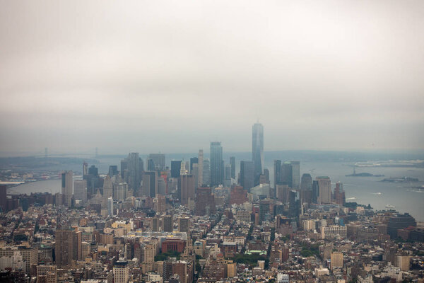Aerial view of Manhattan skyscrapers at cloudy day time