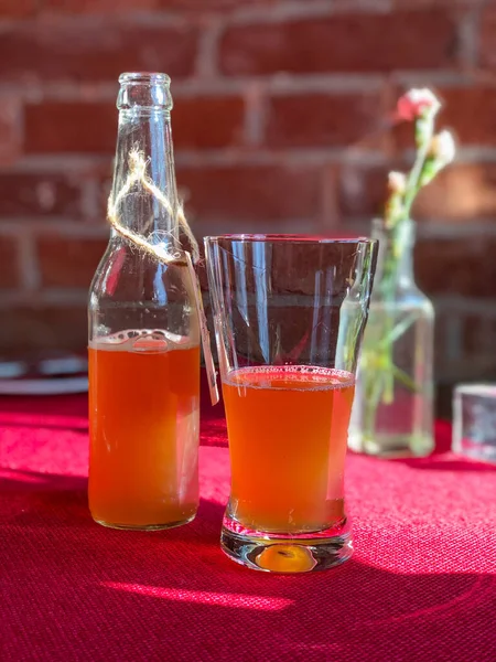 Homemade organic lemonade in the bottle with glass — Stock Photo, Image