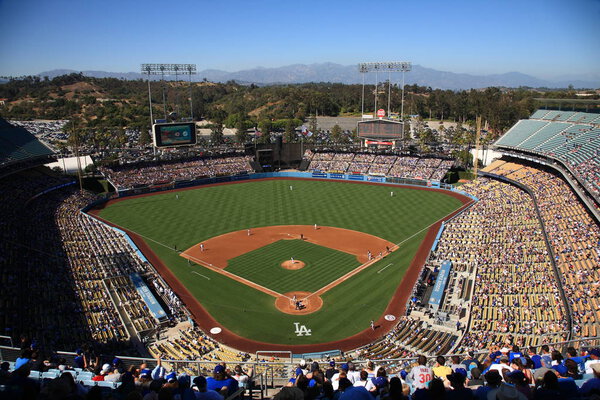 Dodger Stadium - Los Angeles Dodgers. LOS ANGELES - JUNE 30: Classic view of Dodger Stadium before a sunny day baseball game on June 30, 2012 in Los Angeles, California. Dodger Stadium opened in 1962 and cost $23 million.
