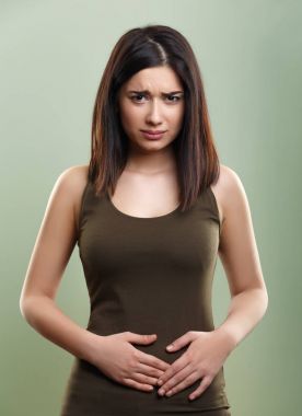 Woman having stomach abdominal pain clipart