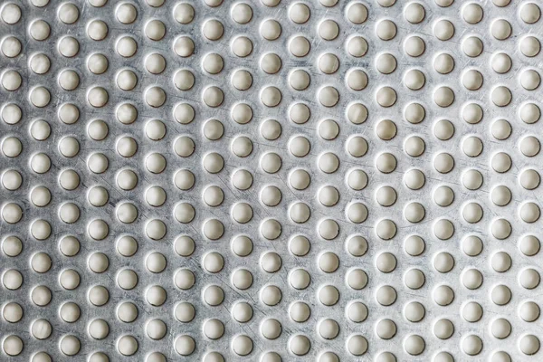 Silver metal shaped like a honeycomb for design background.