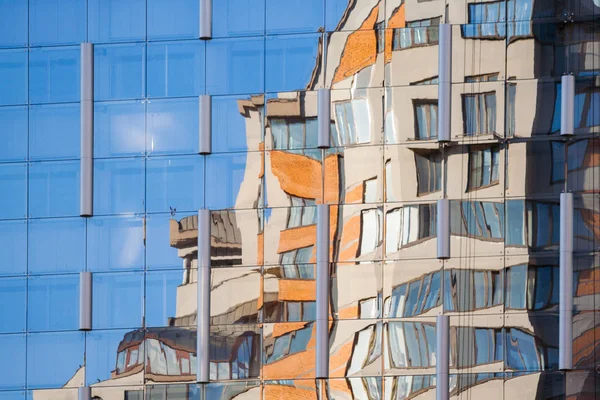 A building with mirror glass