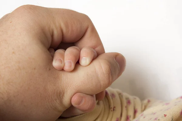 Young Child Reaches Out Grabs Her Fathers Hand — Stock Photo, Image