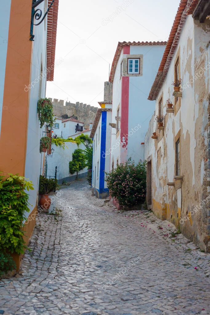 Charming streets of old town Obidos in Portugal