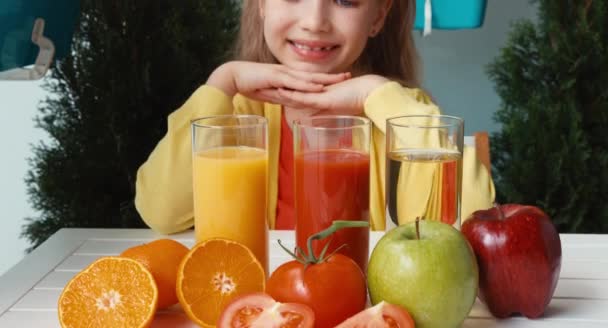 Closeup portrait laughing girl promoting a healthy juice. Thumbs up. Ok — Stock Video