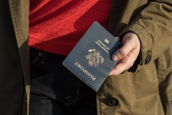 Woman holding passport — Stock Photo, Image