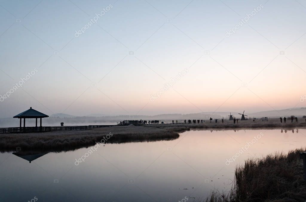 misty lake in the morning/ photo taken on the grassland in deep autumn 