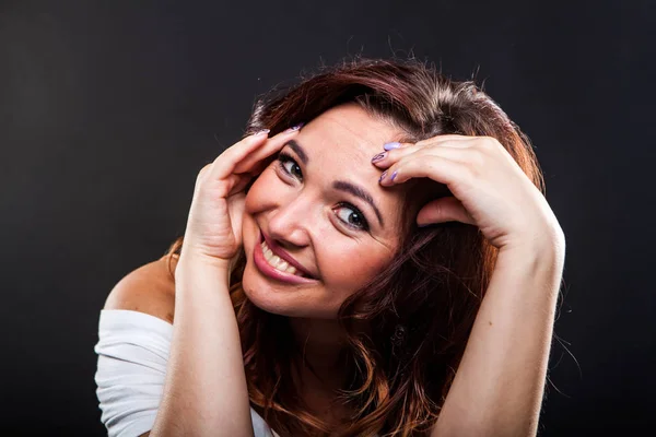 Pretty young girl on black background in studio — Stock Photo, Image