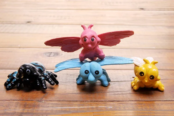 Пластиковые игрушечные насекомые — стоковое фото