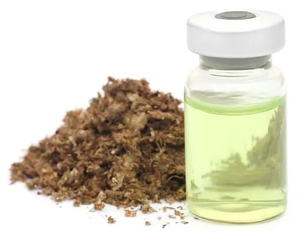 Medicinal cannabis with medicinal drug in a vial — Stock Photo, Image