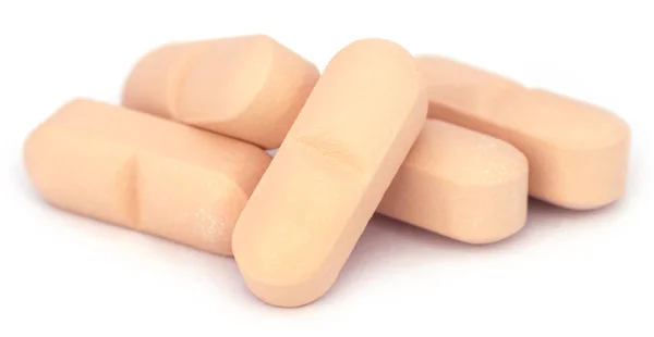 Tabletten auf weißem Hintergrund — Stockfoto