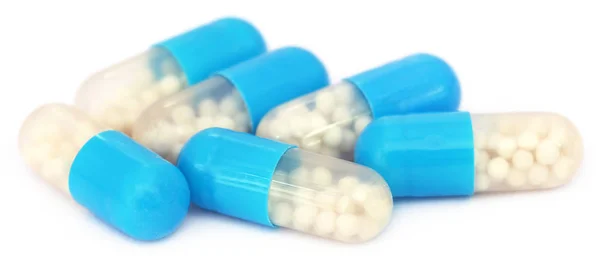 Sommige blauwe en witte capsules — Stockfoto